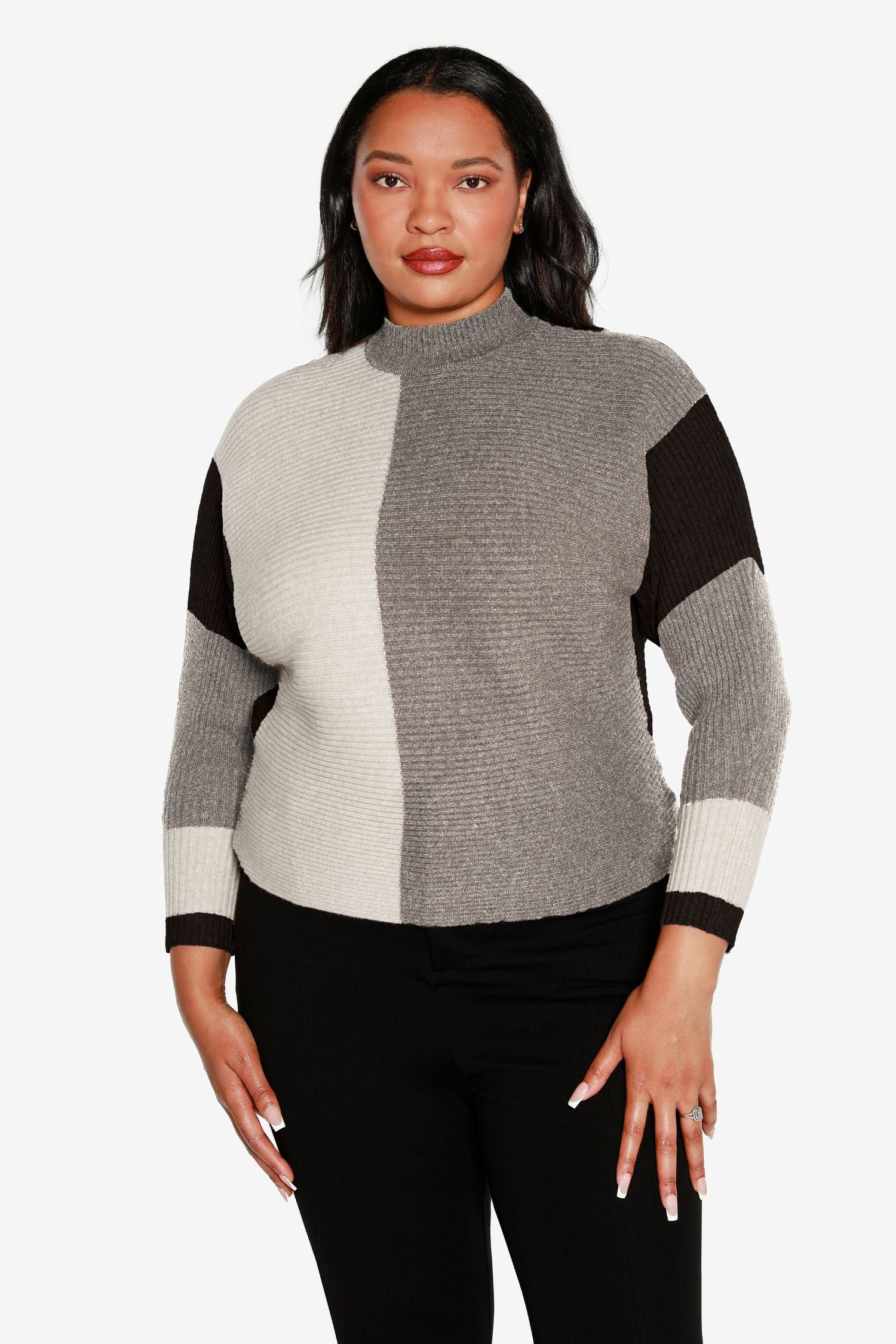 Jersey tipo pulóver para mujer en suave tejido de minicanalé con bloques de color y cuello simulado | con curvas